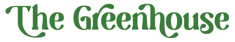 The Greenhouse" is elegantly written in a decorative green font on a pristine white background, standing out like a single post amid nature's splendor.