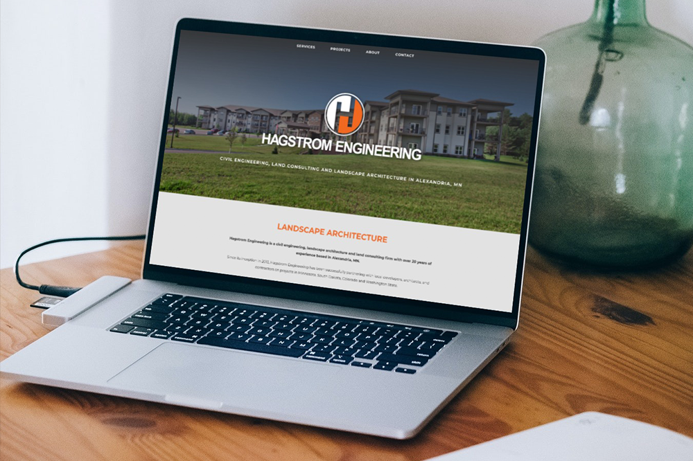Hagstrom Engineering website displayed on a laptop and tablet